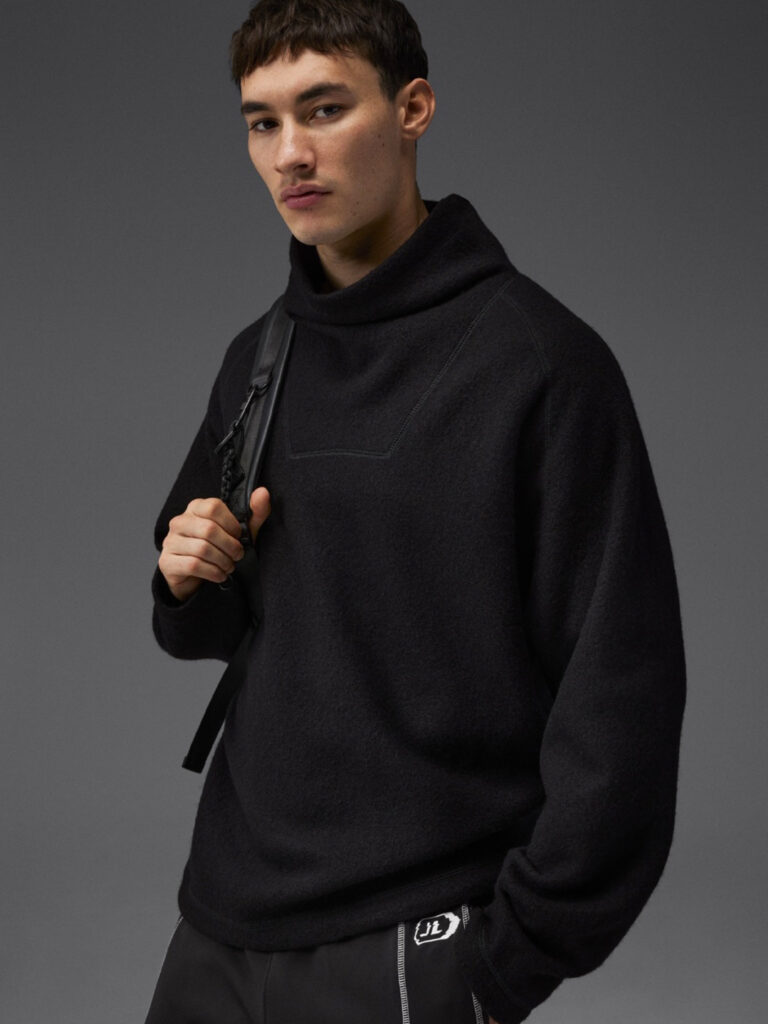 B1672-Armond-Wool-Anorak-Sweater-J-Lindeberg-Black-Front-Half-Body-On-Model