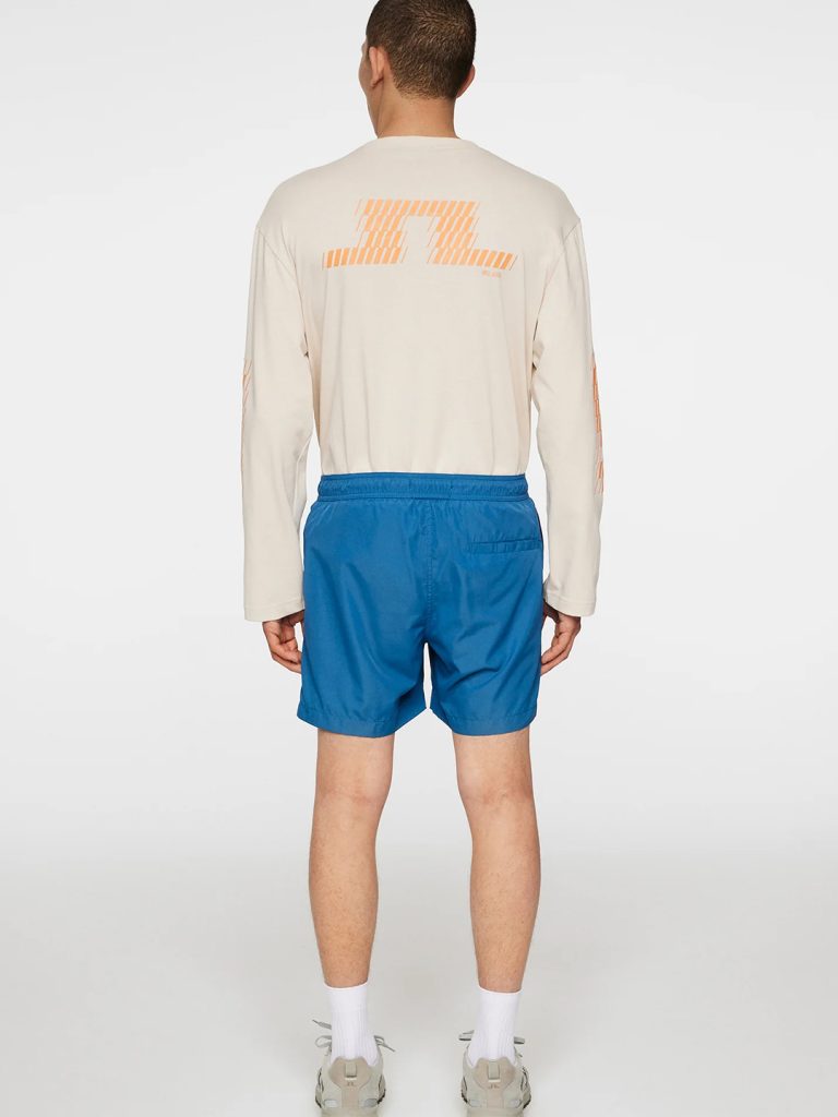 B1741-Banks-Solid-Swim-Trunks-J-Lindeberg-Dk-Blue-Full-Body-Back