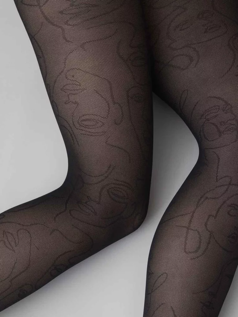 SS0010-Helena-Face-Tights-Swedish-Stockings-Black-Side-Close-Up-Design